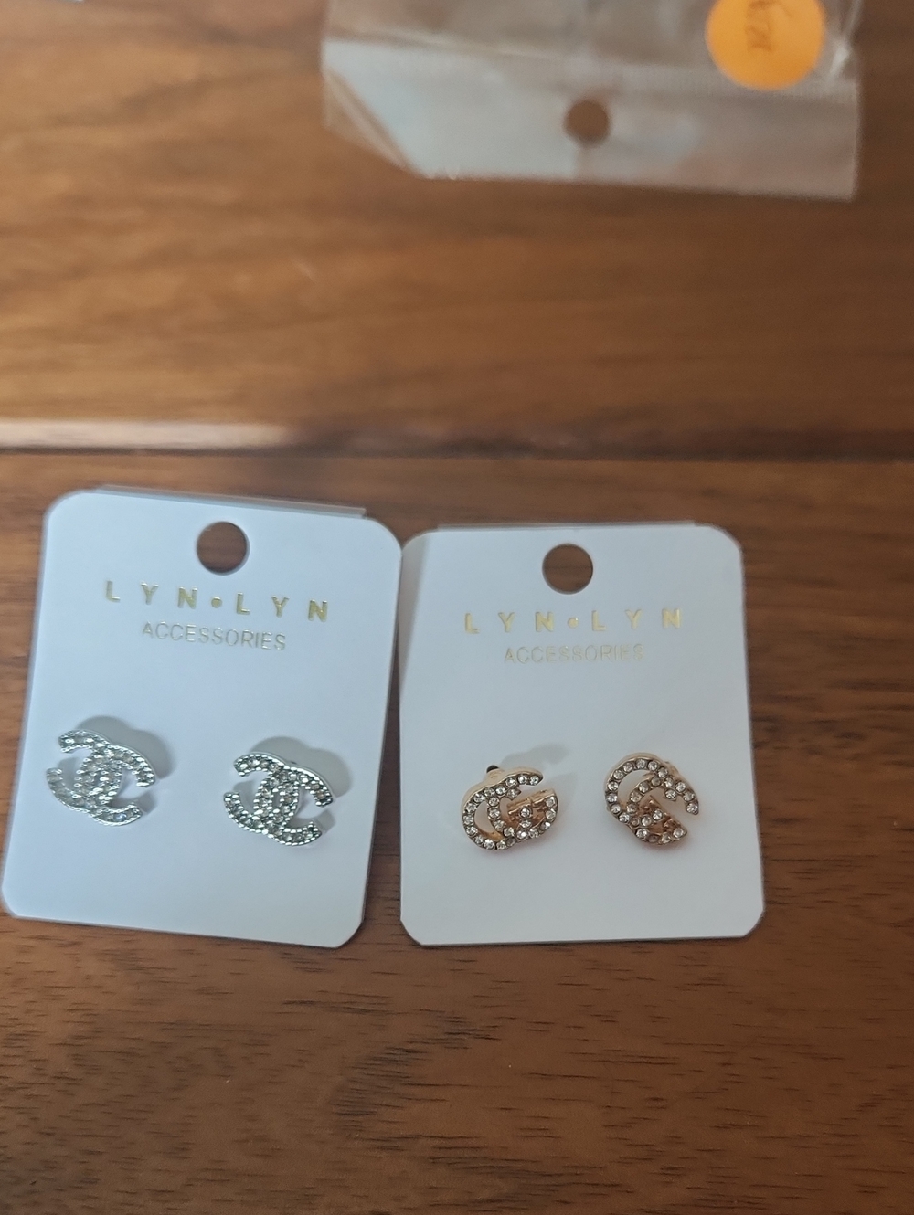 Fashion Jewelry Crystal Logo Stud Earrings - Silver and Gold